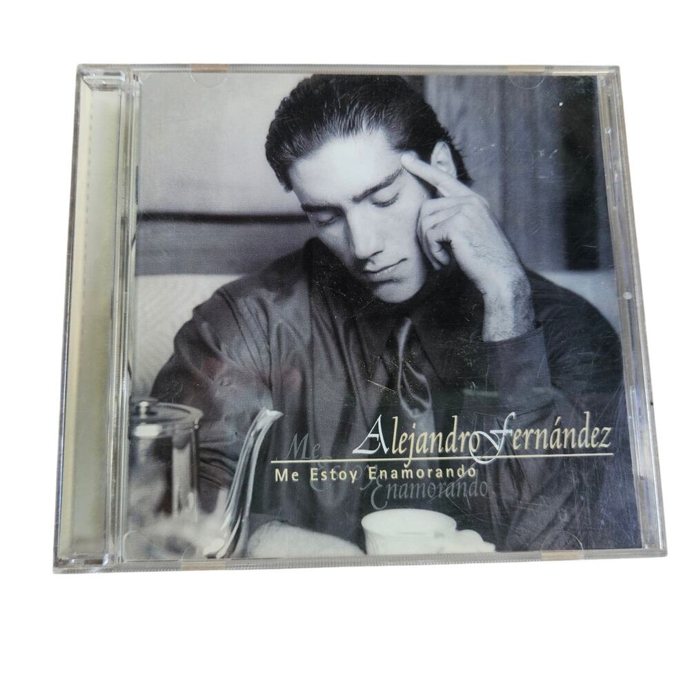 1997 CD Me Estoy Enamorando by the artist Alejandro Fernández.